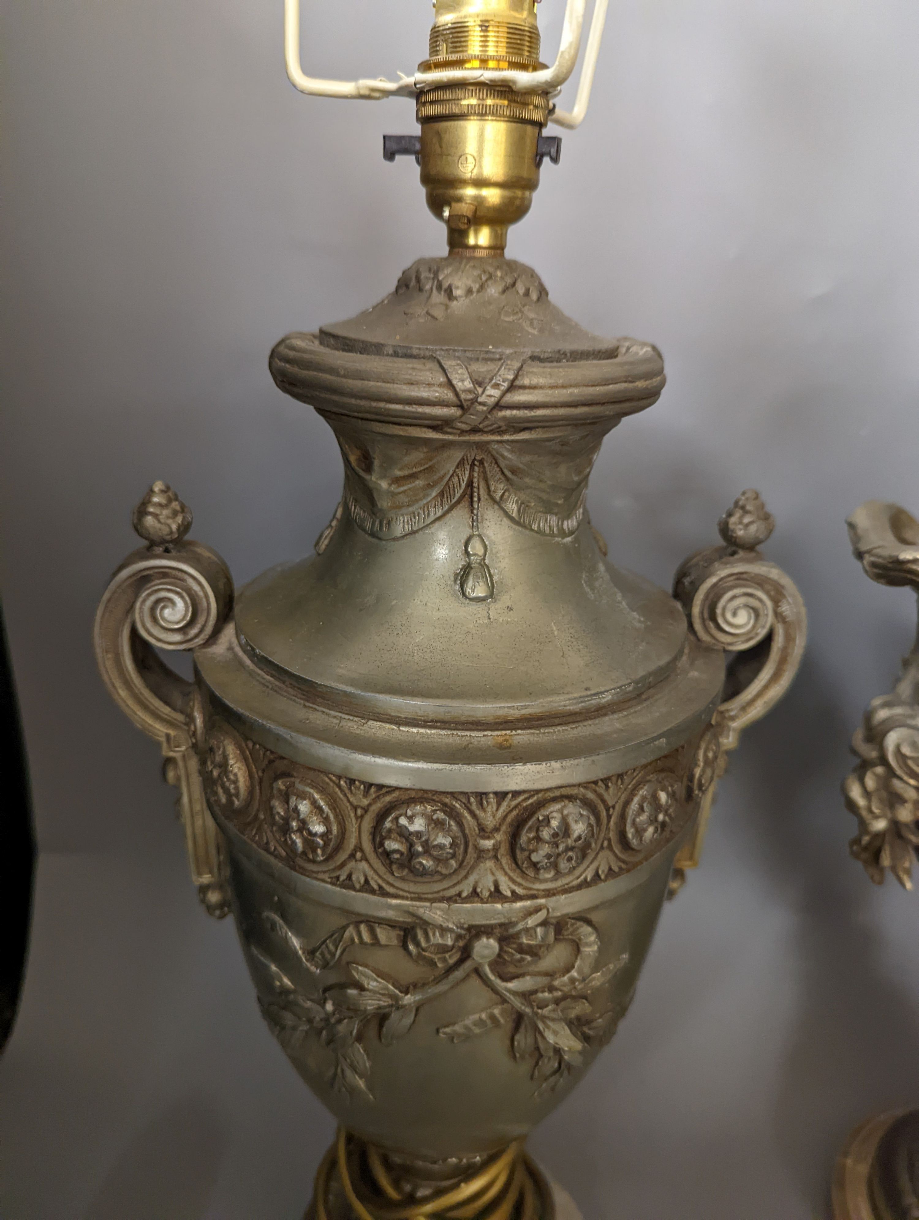A pair of metal based table lamps, Lamp bases17 cms high.